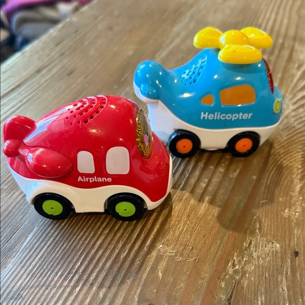 Vtech Colorful Airplane and Helicopter Toy Set lights up and sings